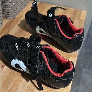 Peloton Black and Red Athletic Shoes Sleek Design